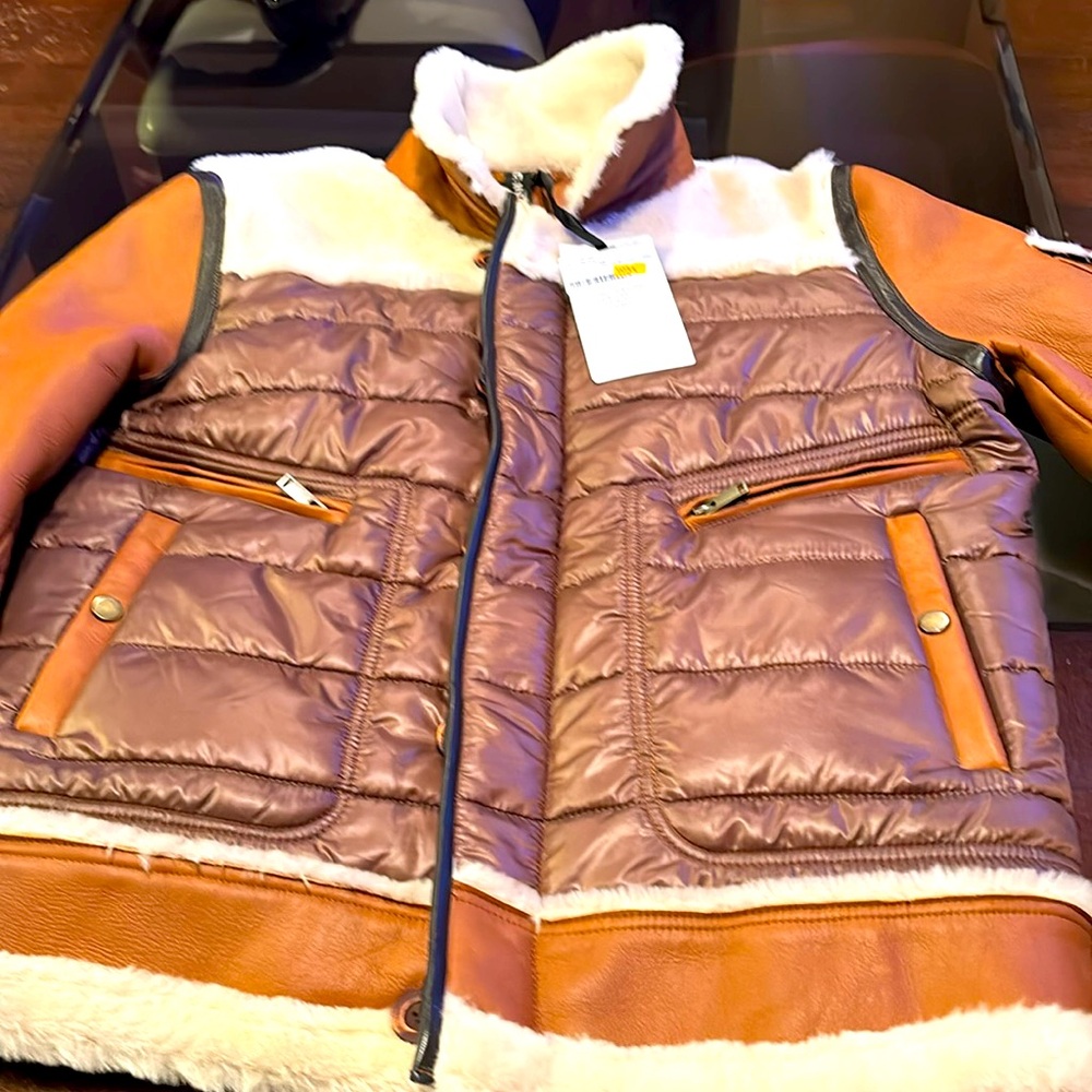 MENS/WOMENS LARGE 100% SHEARLING LEATHER COAT BRAND NEW, NEVER BEEN WORN.